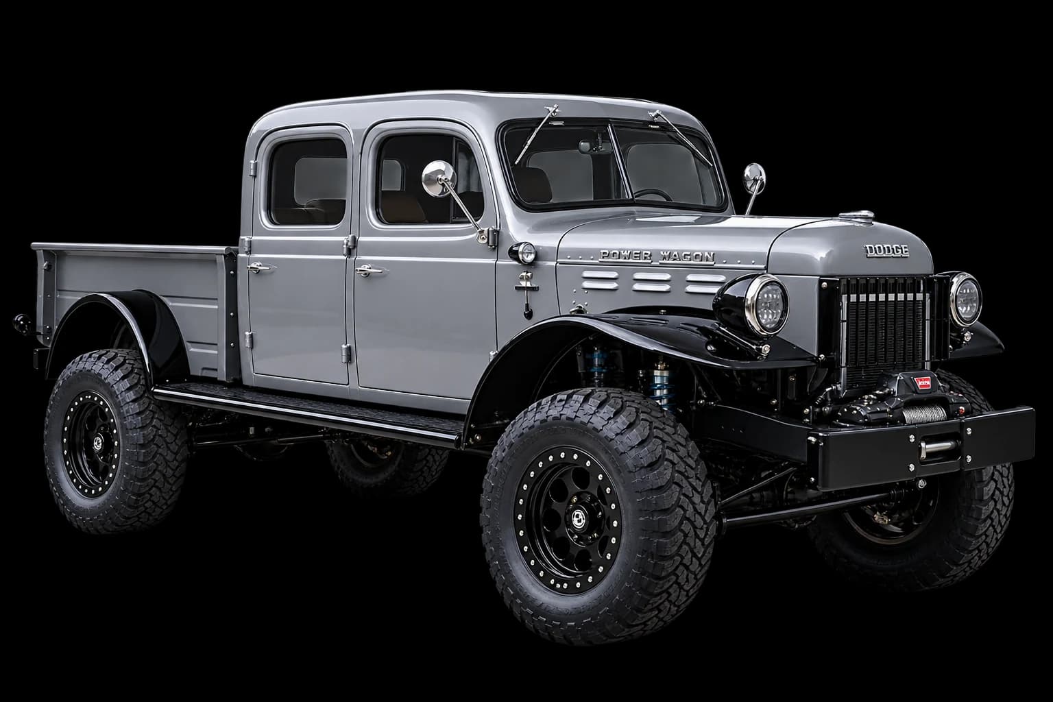 Silver four-door Dodge Power Wagon with black fenders and black wheels