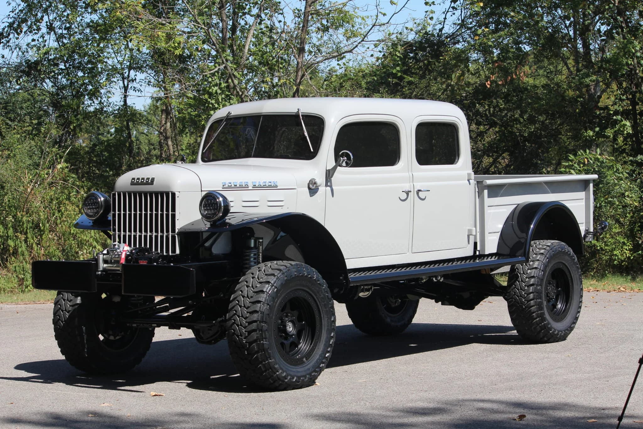 Chalk-colored 1946 four-door Power Wagon with black fenders