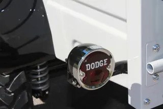 Round red Dodge taillight in a polished surround — photo 39 of 40