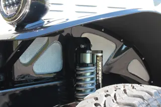 Front coilover and reservoir visible beneath the black fender — photo 24 of 40