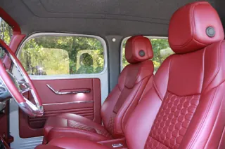Red front seats with patterned inserts and matching headrests — photo 9 of 40