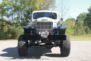 Head-on view of the Power Wagon with round headlights and a bumper-mounted winch — photo 3 of 40