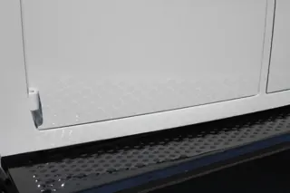 Subtle patterned finish along the lower door above the running board — photo 35 of 40