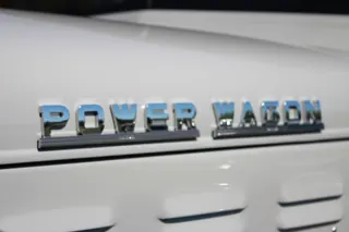 Close-up of the chrome Power Wagon lettering on the chalk-colored hood — photo 32 of 40