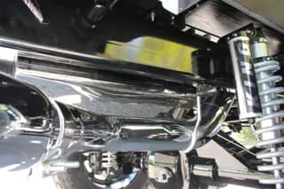 Rear underbody showing suspension and polished exhaust components — photo 26 of 40