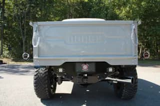 Rear view with embossed Dodge tailgate lettering and the rear suspension visible — photo 6 of 40