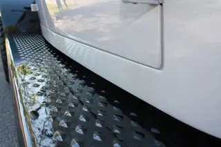 Black textured running board below the four-door cab — photo 34 of 40