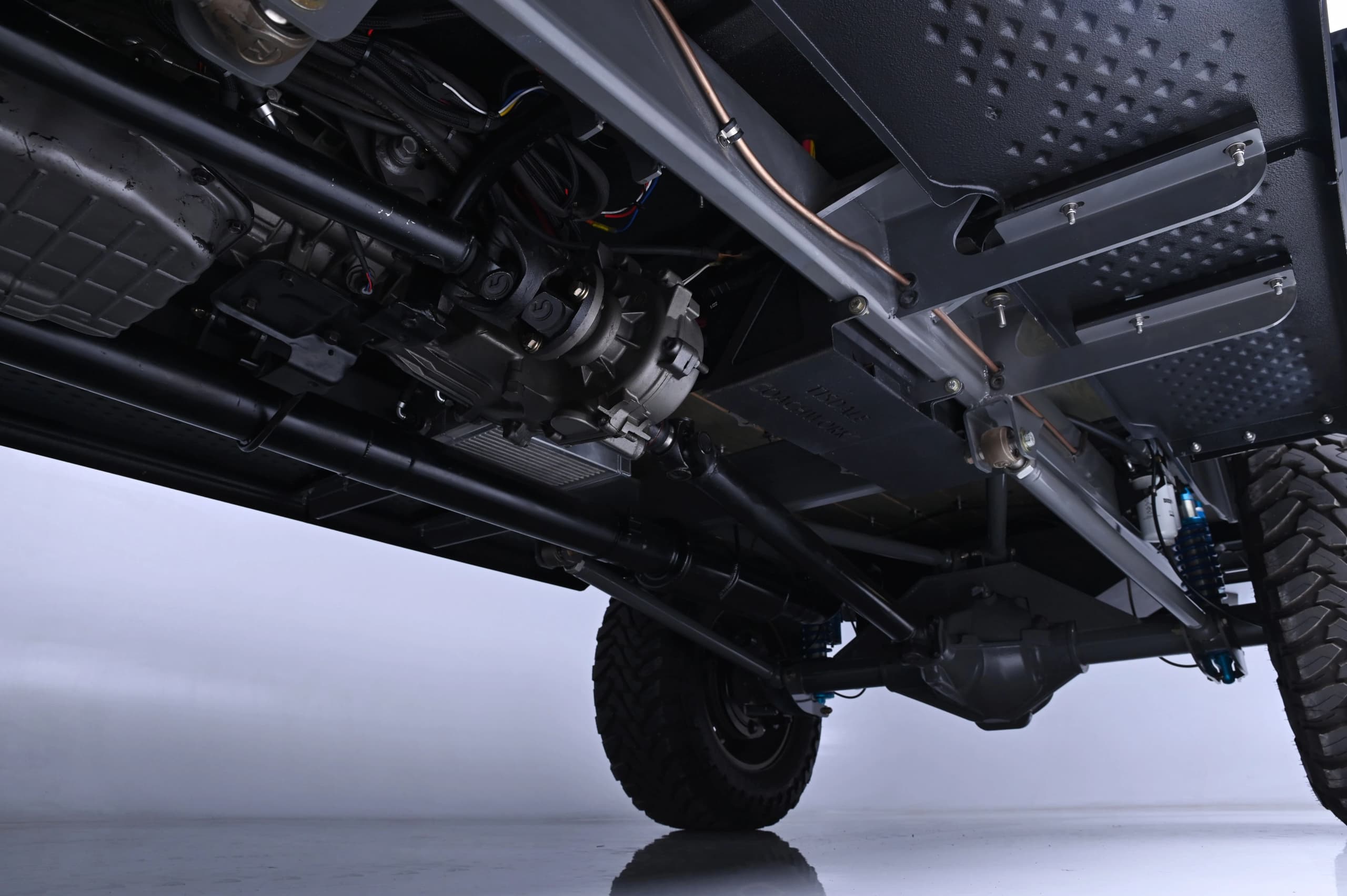 Close-up of the gray Power Wagon chassis and underbody components — photo 8 of 8